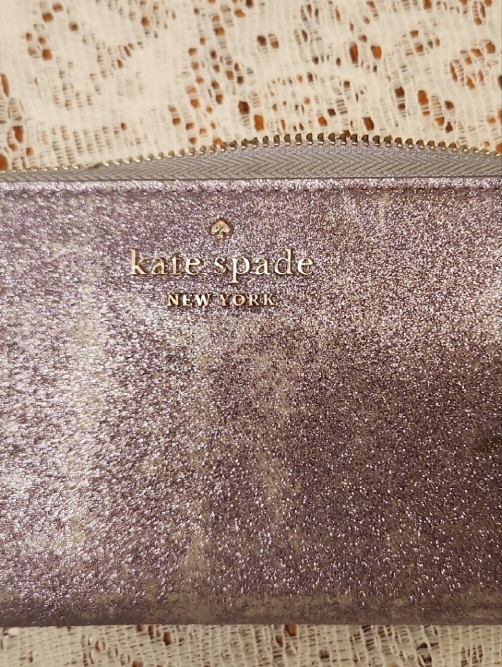 kate spade glitter lavender zip-around wallet with gold logo